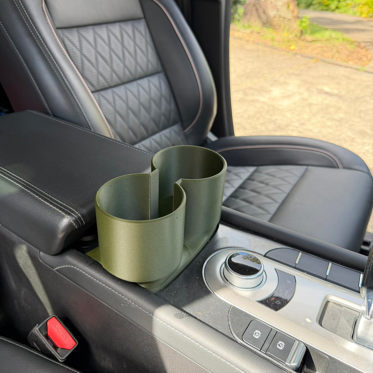GWM Cannon Deluxe Cup Holder Fix, Carbon Olive Green installed in console | SimuVerse.AU