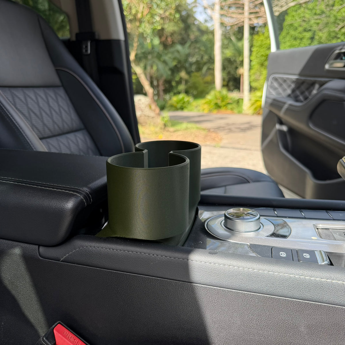 GWM Cannon Deluxe Cup Holder Fix, Carbon Olive Green, side view in console | SimuVerse.AU